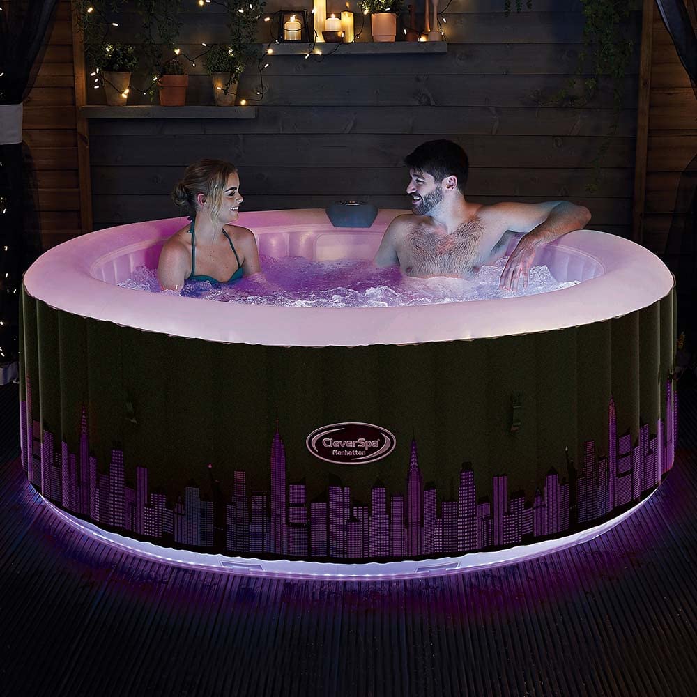 CleverSpa Manhattan 4 Person Round Inflatable Outdoor Bubble Spa Hot Tub with 130 Airjets, 365 Freezeguard Technology - 7 Colour LED Lights - Blue